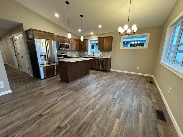 11252 Prairie Village Ln, Becker, MN 55308 - kitchen with stainless steel appliances, a center island, dark wood-type flooring, and decorative light fixtures