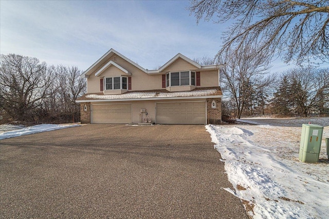 view of front of home featuring a garage