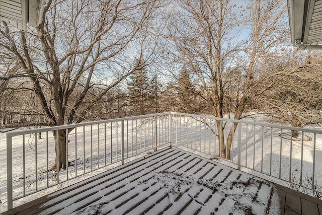 view of snow covered deck