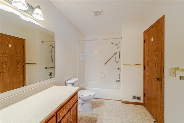 full bathroom with vanity, toilet, and tiled shower / bath combo