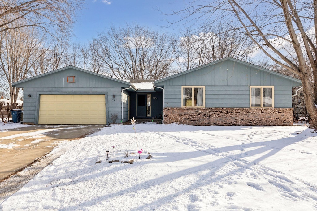 ranch-style home with a garage