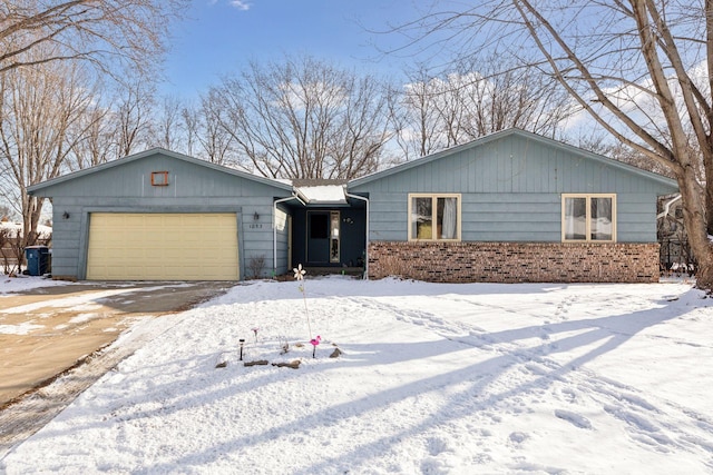 ranch-style home with a garage