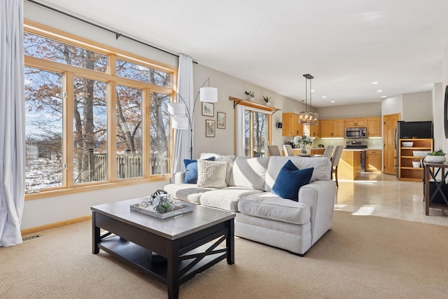 living room featuring visible vents, recessed lighting, and baseboards