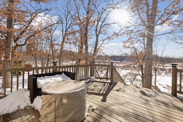 view of snow covered deck