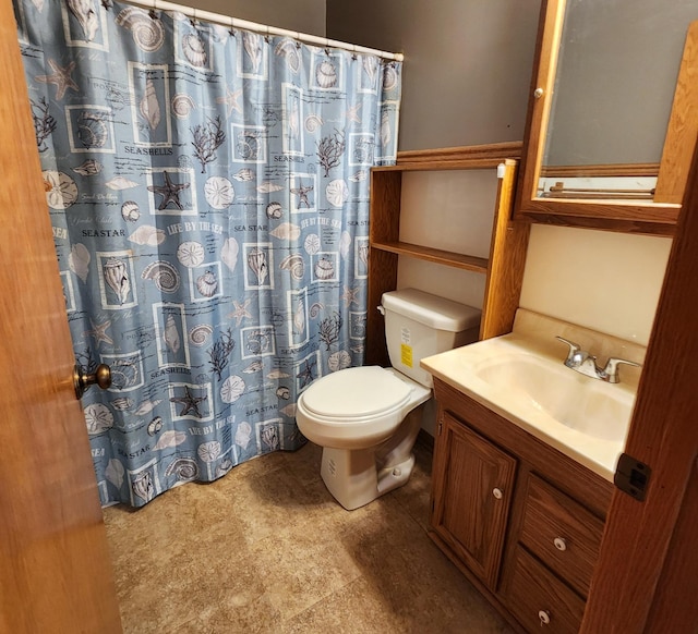 full bathroom with a shower with shower curtain, vanity, and toilet