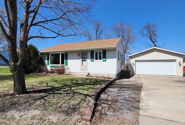 ranch-style house with an outdoor structure, a front lawn, a shingled roof, and entry steps