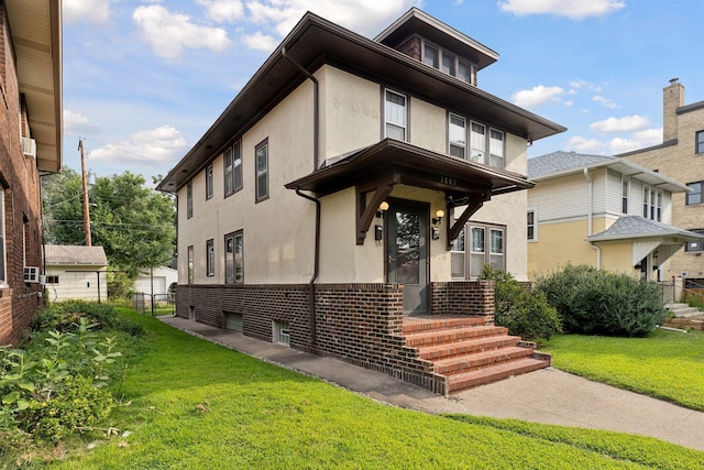 view of front of home with a front lawn