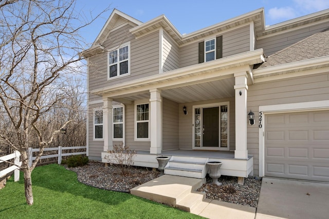 5270 Jewel Ln N, Plymouth, MN 55446 - view of front of home with a porch and a garage