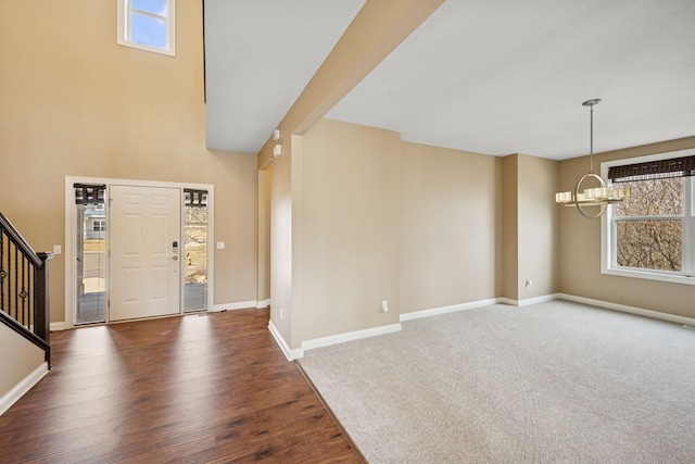 5270 Jewel Ln N, Plymouth, MN 55446 - entrance foyer with stairs, a chandelier, baseboards, and wood finished floors