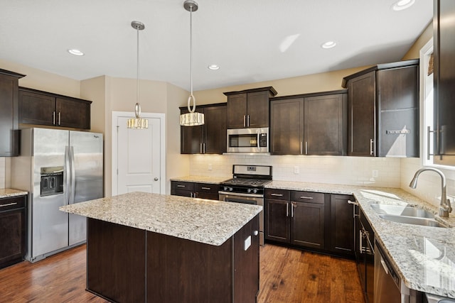 5270 Jewel Ln N, Plymouth, MN 55446 - kitchen featuring appliances with stainless steel finishes, a sink, dark brown cabinetry, dark wood finished floors, and recessed lighting