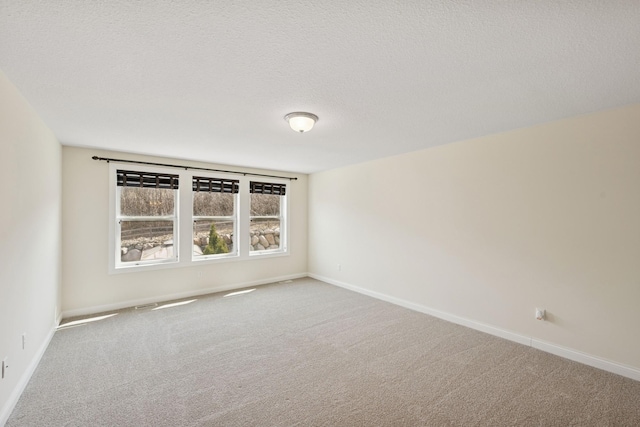 5270 Jewel Ln N, Plymouth, MN 55446 - unfurnished room with carpet flooring, baseboards, and a textured ceiling