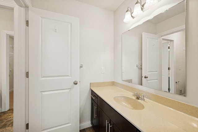 5270 Jewel Ln N, Plymouth, MN 55446 - bathroom with vanity and baseboards