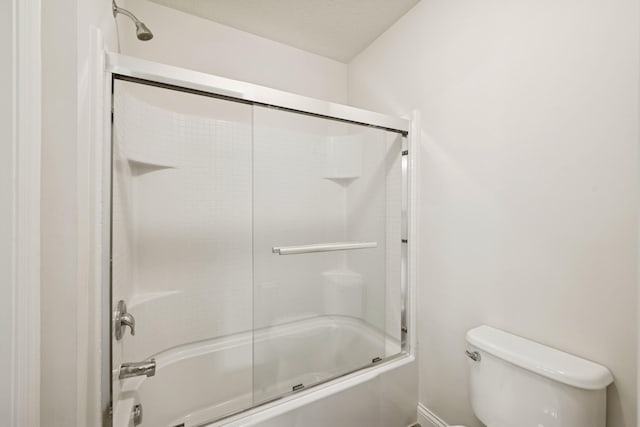 5270 Jewel Ln N, Plymouth, MN 55446 - full bathroom featuring toilet and combined bath / shower with glass door