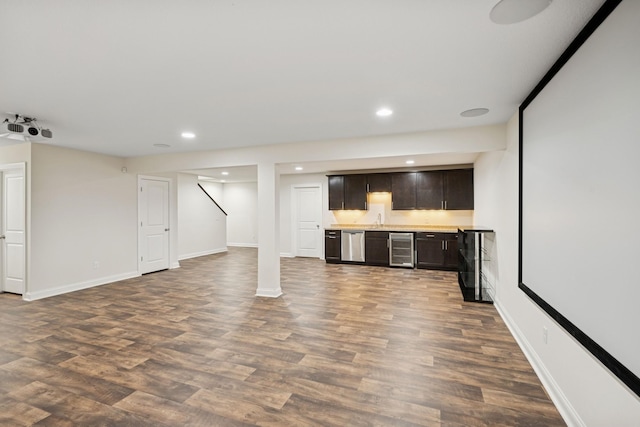5270 Jewel Ln N, Plymouth, MN 55446 - finished below grade area with wine cooler, a sink, dark wood-style flooring, recessed lighting, and baseboards