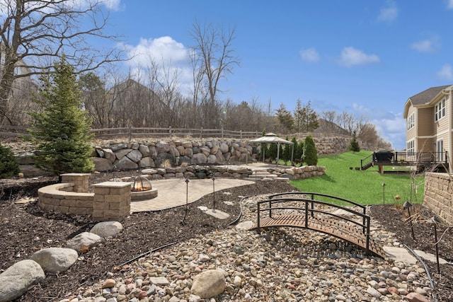 5270 Jewel Ln N, Plymouth, MN 55446 - view of yard with a fire pit, a gazebo, a wooden deck, and a patio area