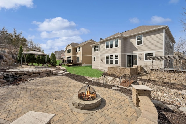 5270 Jewel Ln N, Plymouth, MN 55446 - view of patio / terrace with a gazebo, an outdoor fire pit, and a residential view