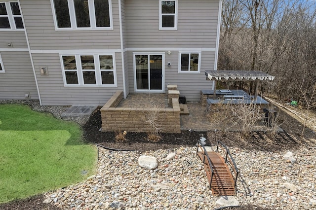 5270 Jewel Ln N, Plymouth, MN 55446 - back of house featuring a carport and a patio area