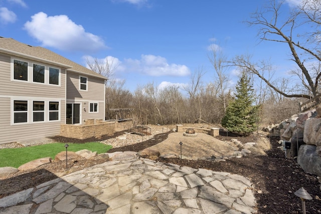 5270 Jewel Ln N, Plymouth, MN 55446 - view of patio featuring a fire pit