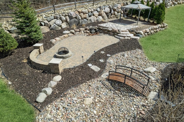 5270 Jewel Ln N, Plymouth, MN 55446 - view of grassy yard featuring a gazebo, a fire pit, and a patio area