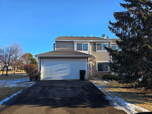 front of property featuring a garage