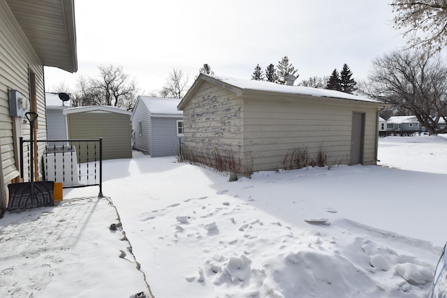 view of yard layered in snow