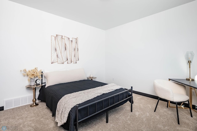 bedroom with light carpet, baseboards, and visible vents