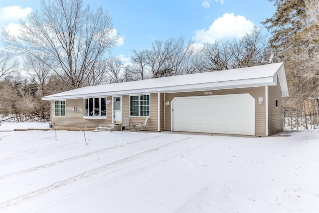 ranch-style house featuring a garage