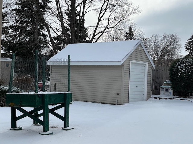 view of snow covered garage