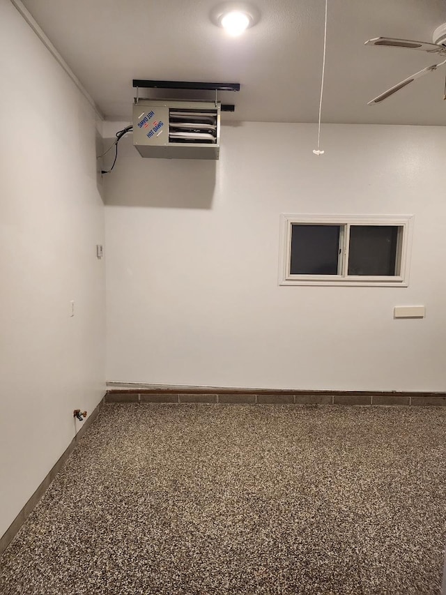 basement featuring ceiling fan