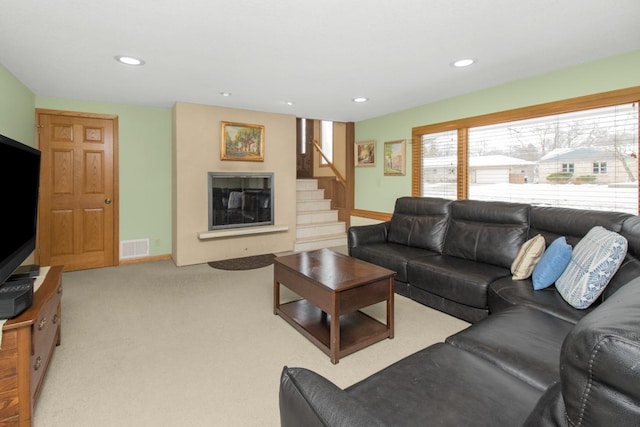 living room featuring light carpet