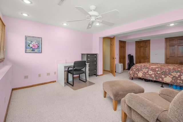 bedroom with light colored carpet and ceiling fan