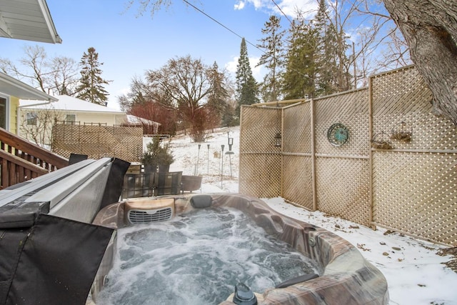 exterior details featuring a jacuzzi