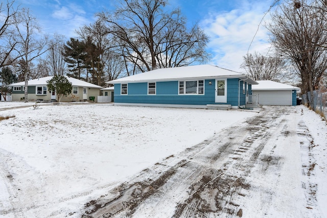 single story home featuring a garage