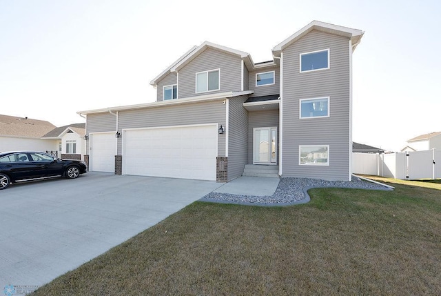 view of front facade with a garage and a front lawn