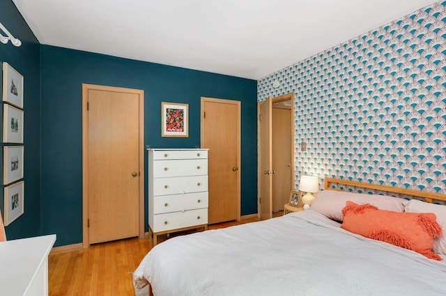 bedroom featuring light wood-type flooring