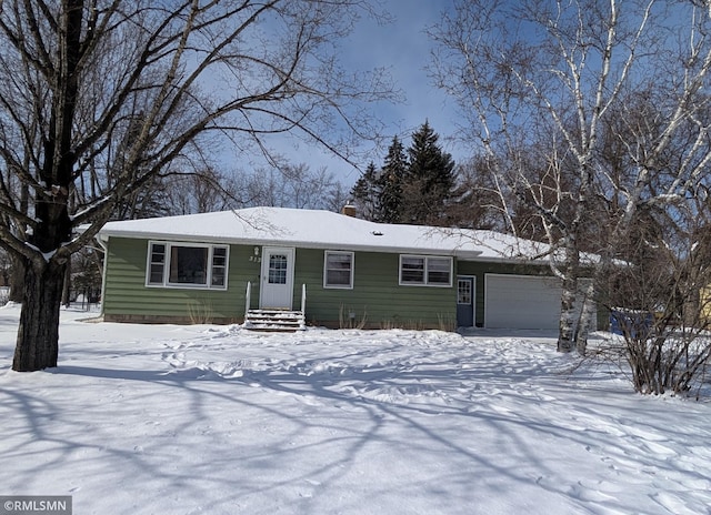 single story home featuring a garage