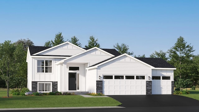 view of front of property featuring a garage and a front yard