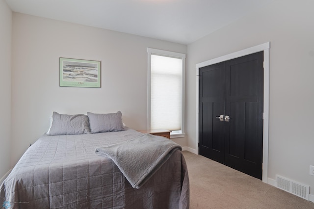 bedroom featuring carpet flooring