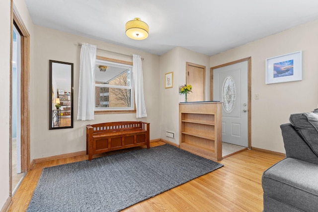 foyer featuring hardwood / wood-style flooring