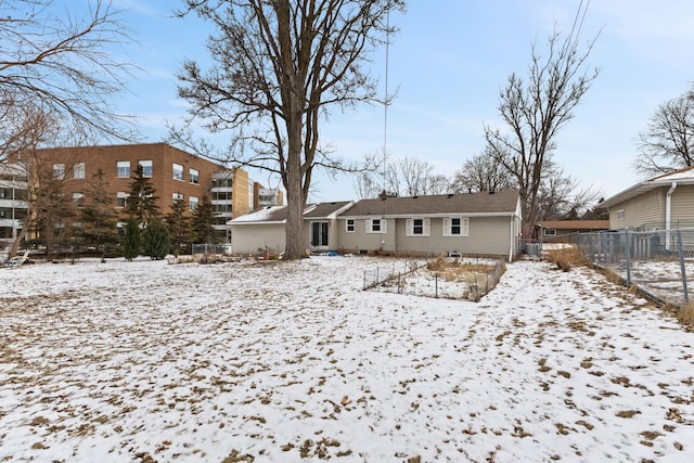 view of snow covered property