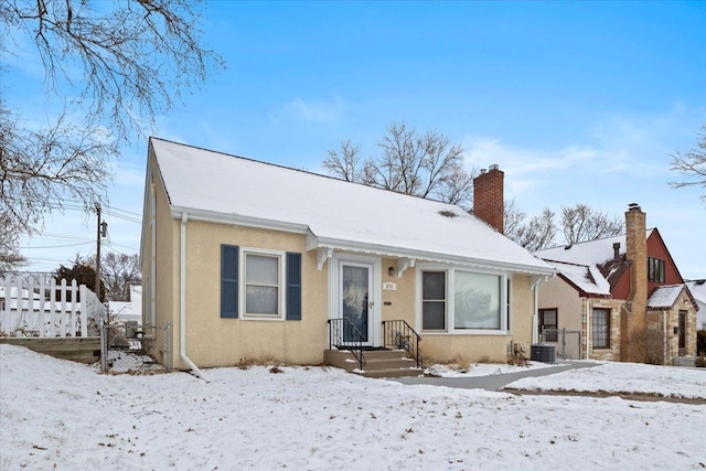 bungalow with central air condition unit