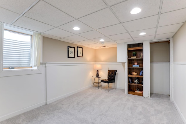 unfurnished room featuring light colored carpet