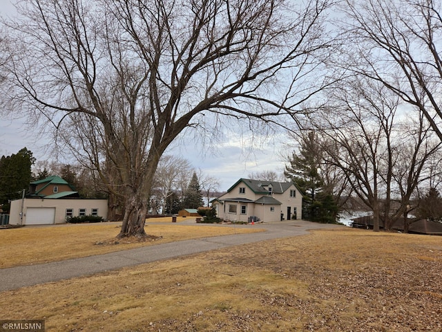 view of yard with a garage