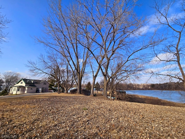 view of yard with a water view