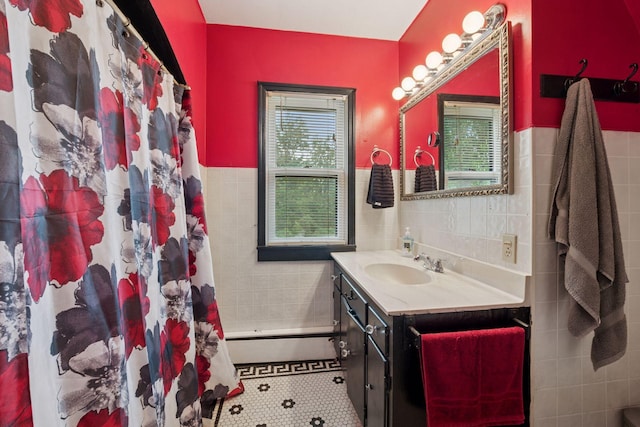 5801 23rd Ave S, Minneapolis, MN 55417 - full bathroom featuring tile walls, vanity, tile patterned flooring, a wainscoted wall, and a shower with shower curtain