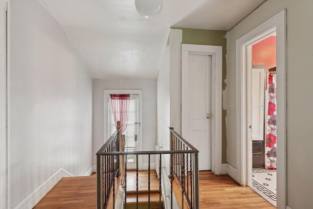 5801 23rd Ave S, Minneapolis, MN 55417 - hall featuring an upstairs landing and light wood finished floors