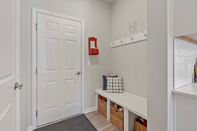 4884 Avery Ct, Eagan, MN 55123 - mudroom featuring baseboards and light wood-type flooring