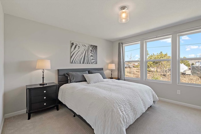4884 Avery Ct, Eagan, MN 55123 - bedroom with light carpet and baseboards