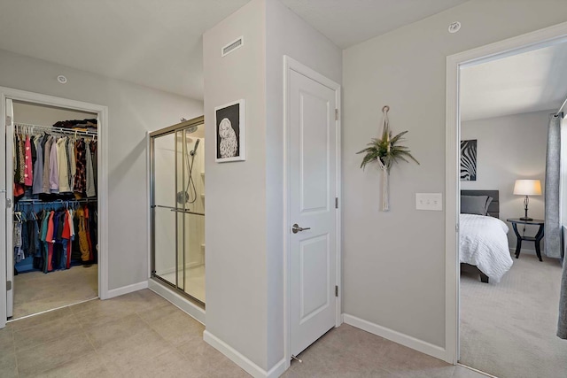 4884 Avery Ct, Eagan, MN 55123 - corridor featuring baseboards and light carpet