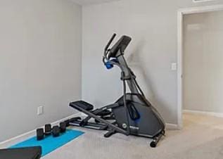 4884 Avery Ct, Eagan, MN 55123 - workout area with baseboards and carpet floors